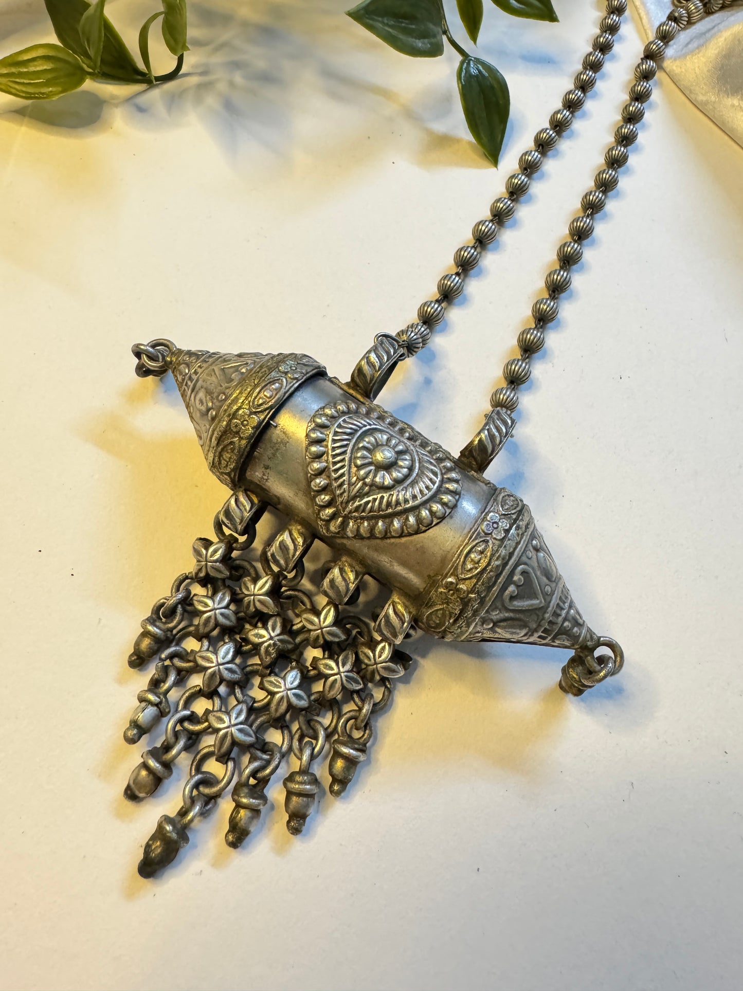 Raksha silverlookalike Neckpiece
