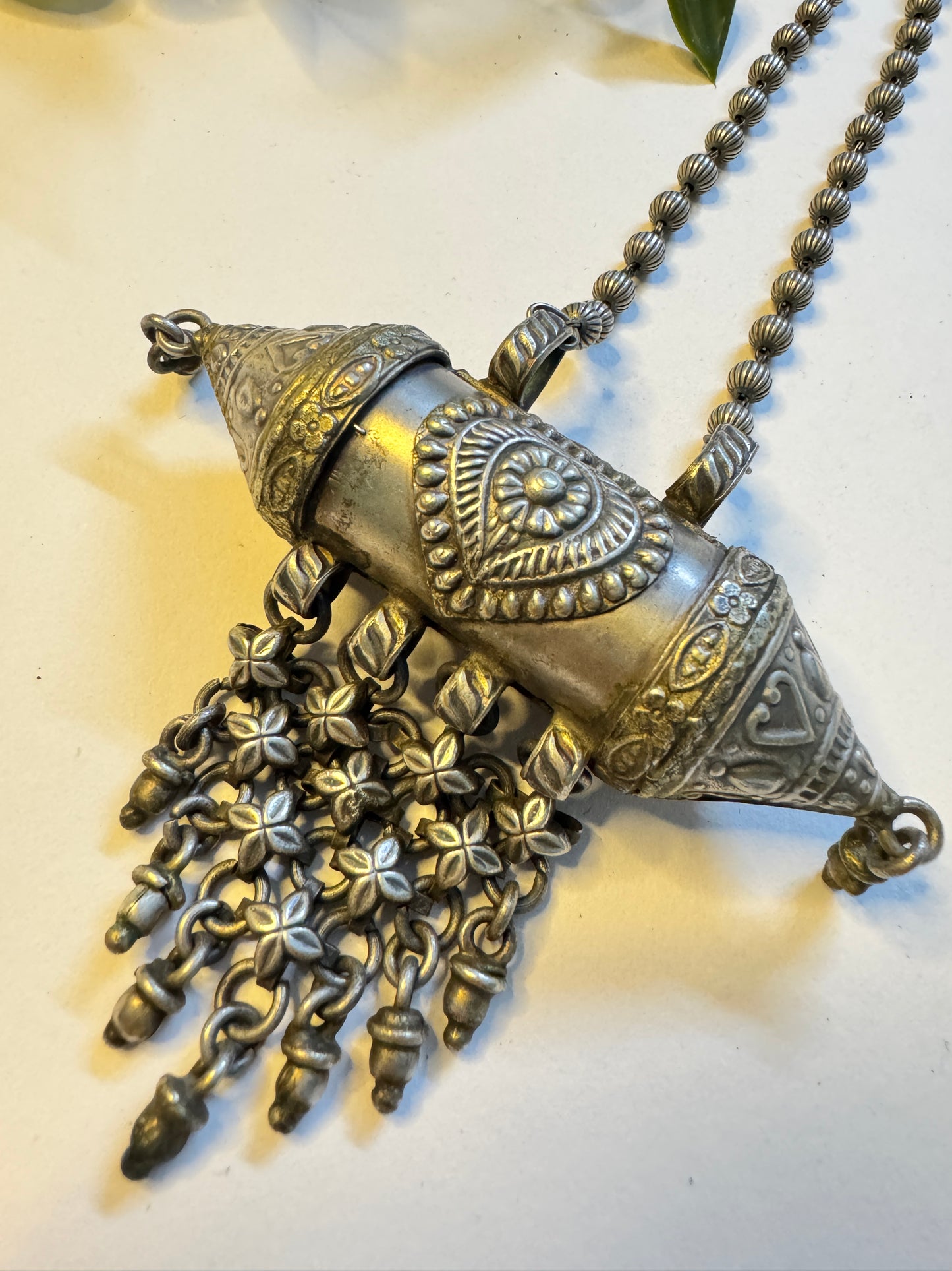 Raksha silverlookalike Neckpiece