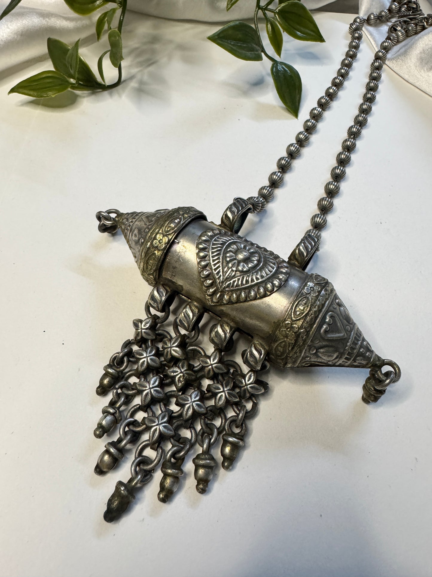 Raksha silverlookalike Neckpiece